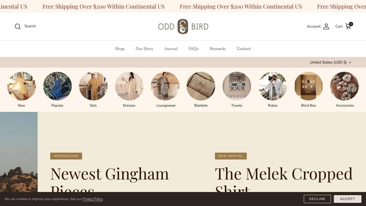 OddBird artisan textile ecommerce homepage with collection navigation and product imagery